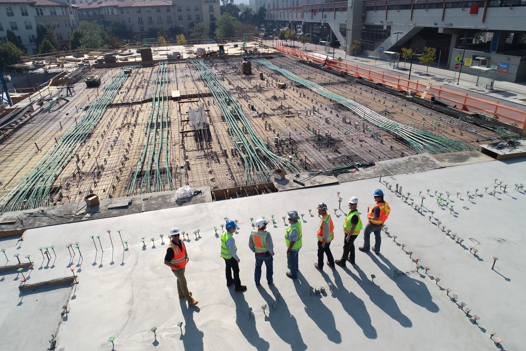 Construction professionals coordinating on site